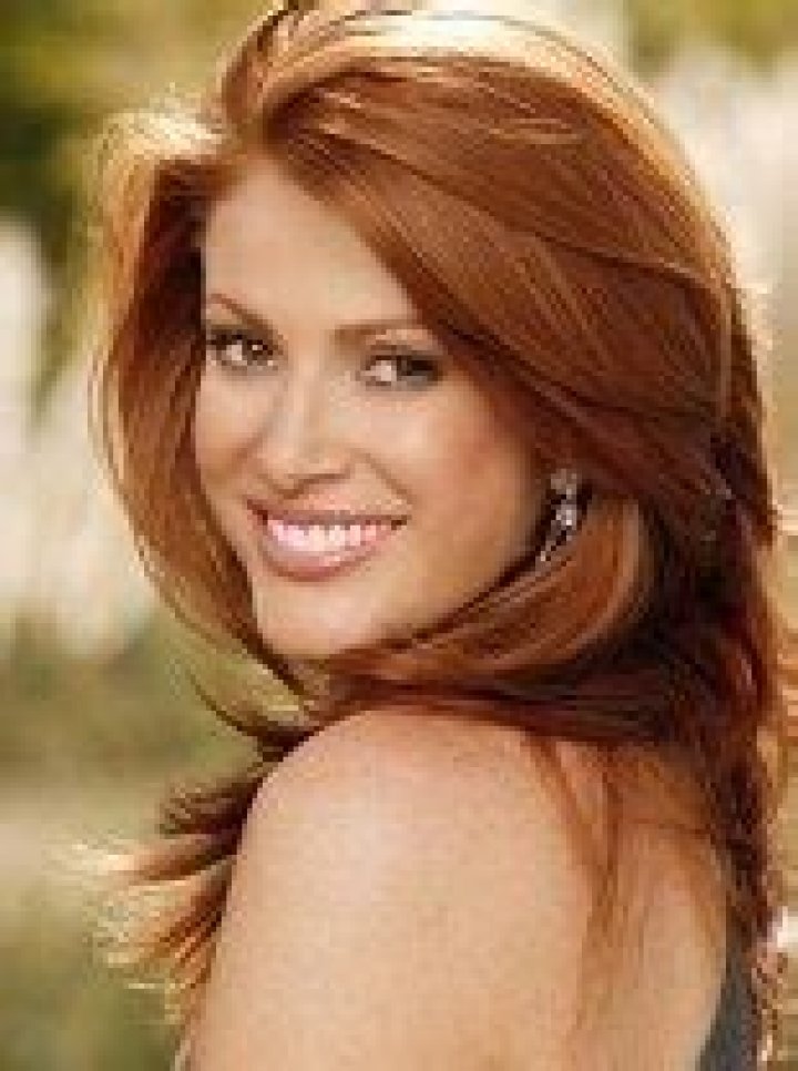 Sports Illustrated model Angie Everhart marries Carl Ferro in sunset